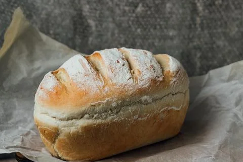 Homemade, fresh bread cools down after baking. Selective focus. place for tex Stock Photos