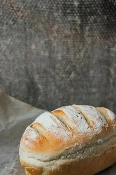 Homemade, fresh bread cools down after baking. Selective focus. place for tex Stock Photos