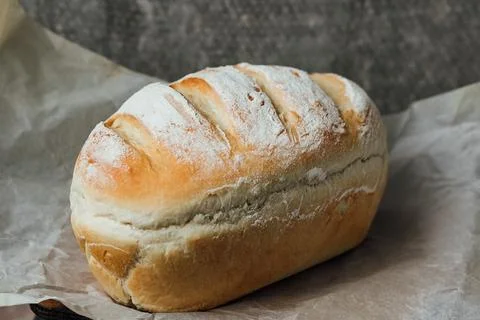 Homemade, fresh bread cools down after baking. Selective focus. place for tex Stock Photos