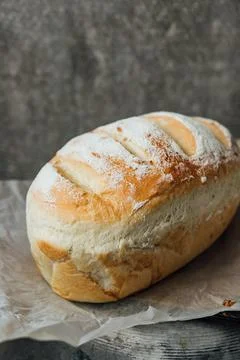Homemade, fresh bread cools down after baking. Selective focus. place for tex Stock Photos