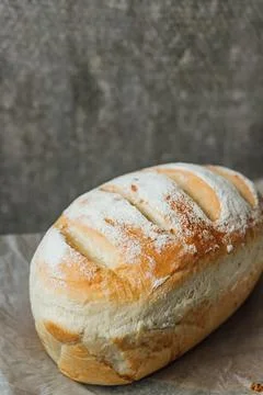 Homemade, fresh bread cools down after baking. Selective focus. place for tex Stock Photos