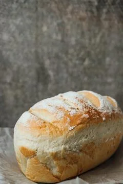 Homemade, fresh bread cools down after baking. Selective focus. place for tex Stock Photos
