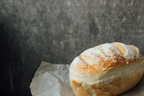 Homemade, fresh bread cools down after baking. Selective focus. place for tex Foto stock
