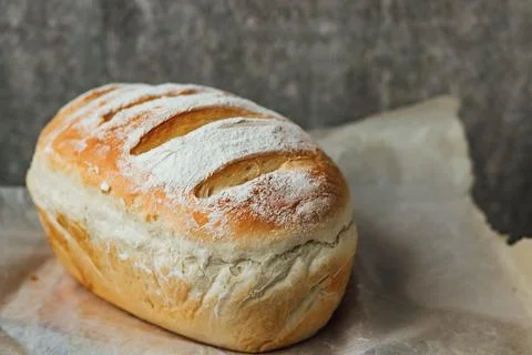 Homemade, fresh bread cools down after baking. Selective focus. place for tex Stock Photos