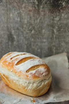 Homemade, fresh bread cools down after baking. Selective focus. place for tex Stock Photos