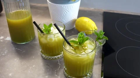 Homemade Fresh Mint Lemonade with Ice, Refreshing Summer Drink Stock Footage 339805341