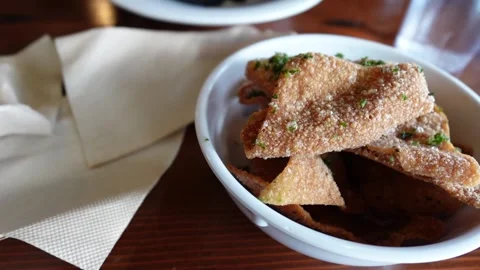 Homemade fried chips panning on a camera Stock-Footage 303256510