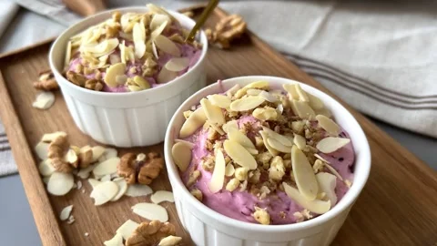 Homemade fruit ice cream without sugar and flour in porcelain bowl Stock Footage 304879502