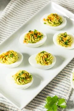 Homemade Green Avocado Deviled Eggs Stock Photos