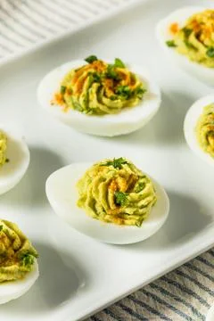 Homemade Green Avocado Deviled Eggs 스톡 사진