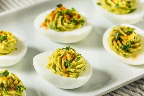 Homemade Green Avocado Deviled Eggs Stock Photos