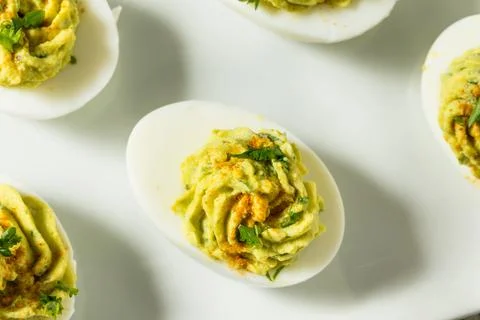 Homemade Green Avocado Deviled Eggs Stock Photos