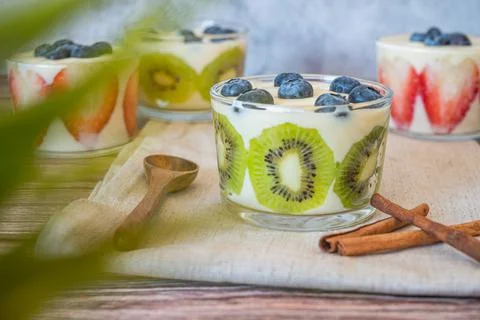 Homemade Healthy breakfast in a glass with fresh fruits: kiwi, strawberry and Stock Photos