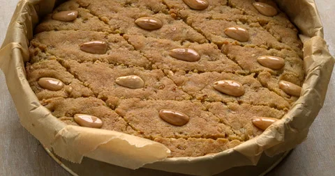 Homemade helbeh in a baking tin lined with baking paper. Stock Footage 292318726