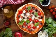 Homemade Italian Pizza On Wooden Table Top View Stock Photos