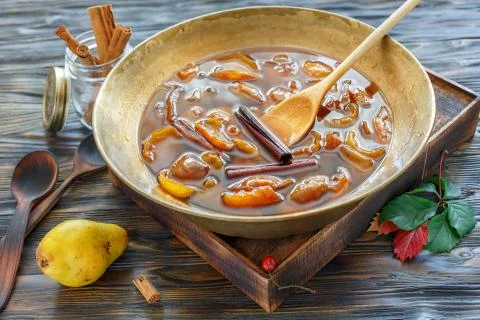 Homemade jam from pears with cinnamon. Stock Photos