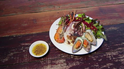 Homemade lunch plate of shellfish Stock Footage 63363436