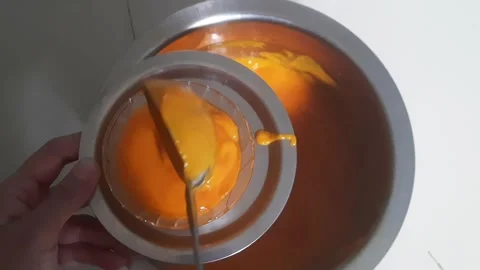 Homemade Mango Puree Being Served into a Bowl Video stock 336247376