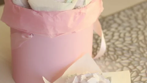 Homemade marshmallows of different shapes and sizes. Gift wrapped. Close-up s Stock Footage 163651898
