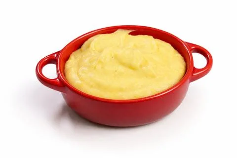 Homemade mashed potatoes in a red dish Stock Photos