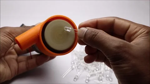 The homemade mini grinder machine in work grinding outer cases of LED Stock Footage 172282240