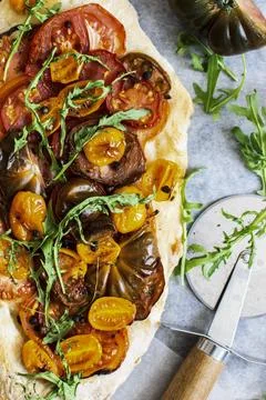 Homemade mixed tomatoes flatbread menu Stock Photos