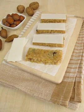 Homemade nut bars with almonds, hazelnuts and walnuts Stock Photos