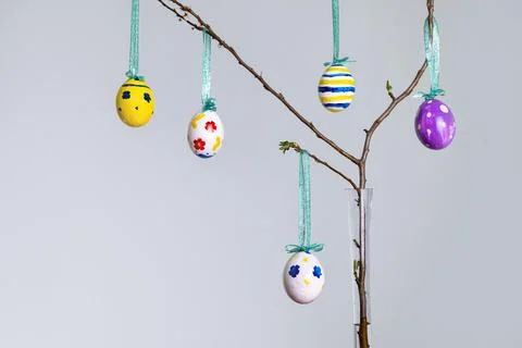 Homemade painted Easter eggs on spring brunch, copy space. Stock Photos