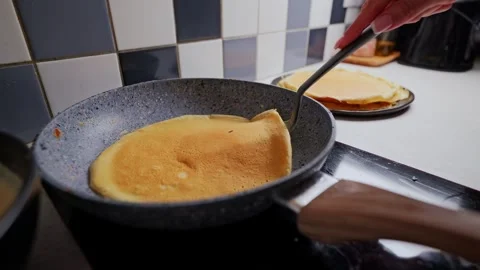 Homemade Pancake Joins A Growing Stack Of Freshly Cooked Family Favorites Stock Footage 337481598