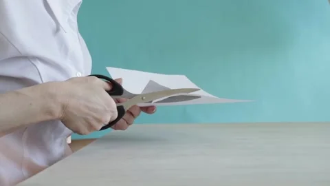 Homemade paper shredding activity captured in natural light, casual home se.. Stock Footage 315517348