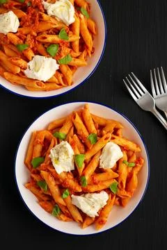 Homemade Penne Alla Vodka With Bacon, Cheese and Basil. Stock Photos