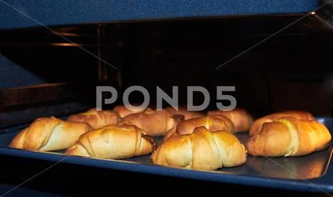 Homemade pies on the baking sheet Stock Photos