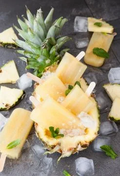 Homemade pineapple popsicles Stock Photos