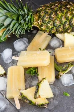 Homemade pineapple popsicles Stock Photos