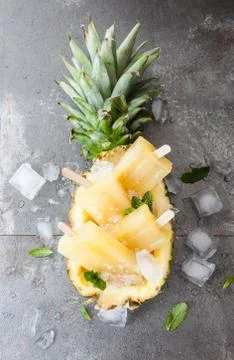 Homemade pineapple popsicles Stock Photos