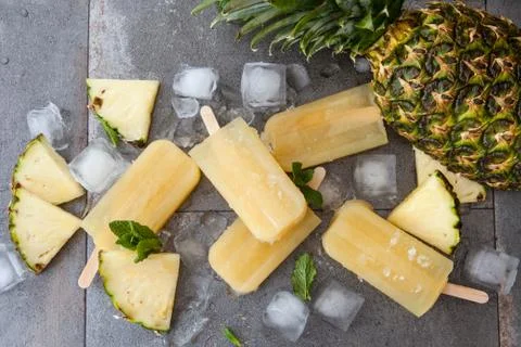 Homemade pineapple popsicles Stock Photos