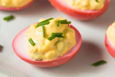 Homemade Pink Pickled Deviled Eggs 스톡 사진