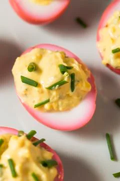 Homemade Pink Pickled Deviled Eggs 스톡 사진