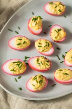 Homemade Pink Pickled Deviled Eggs 스톡 사진