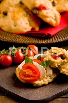 Homemade pizza rolls stuffed with tomato and mozzarella Stock Photos