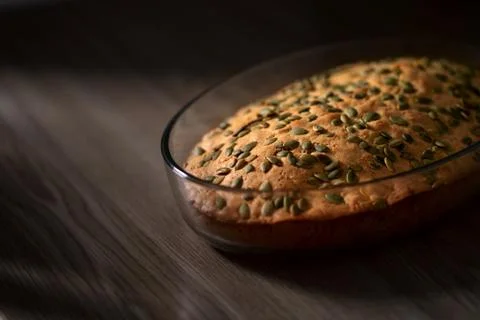 Homemade pumpkin pie on the table. Stock Photos