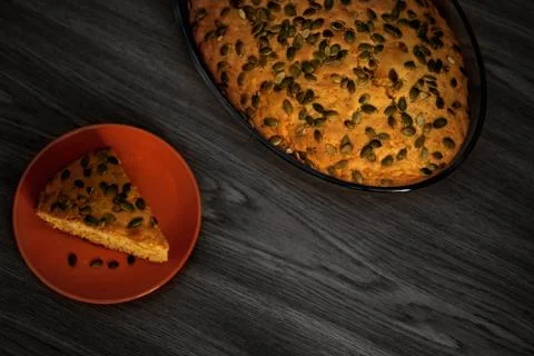 Homemade pumpkin pie on the table. Stock Photos