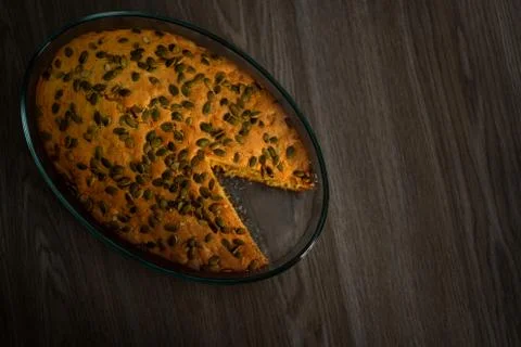 Homemade pumpkin pie on the table. Stock Photos