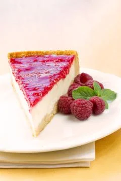 Homemade raspberry cheesecake slice Stock Photos