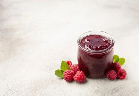 Homemade raspberry jam in jar Stock Photos