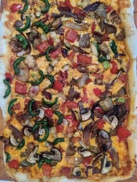 Homemade Rectangular Vegetable Pizza With Golden Crust Stock Photos