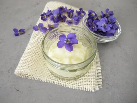 Homemade solid deodorant with sweet violet scent Stock Photos