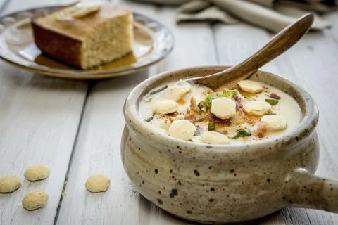 Homemade soup and side of cornbread. Stock Photos