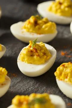 Homemade Spicy Deviled Eggs with Paprika and Dill Stock Photos