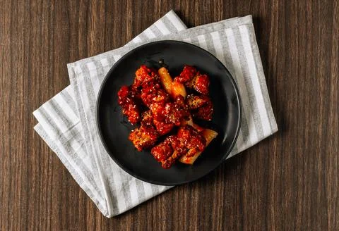 Homemade Spicy Korean fried chicken wings with sauce. Traditional Korean Food Stock Photos